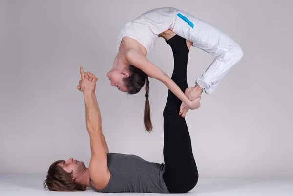 Young healthy couple in yoga position, Man and woman — Stock Photo, Image