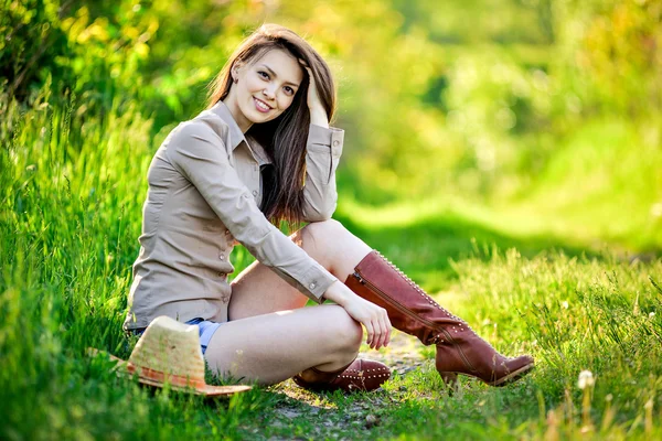 Young beautiful girl in a cowboy hat — Stock Photo, Image