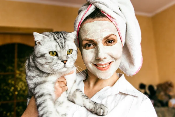 Funny woman cosmetic mask and glasses close-up — Stock Photo, Image