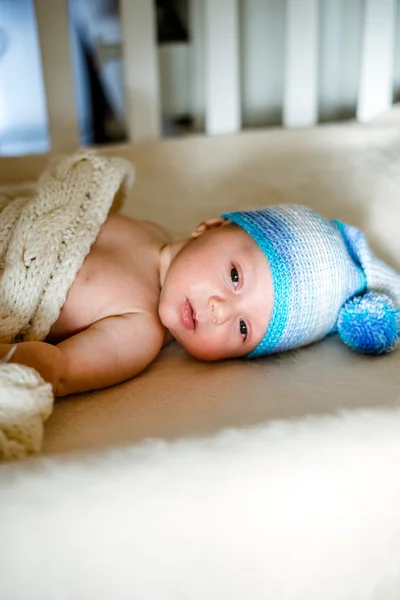 Two month old baby sound asleep in his crib — Stock Photo, Image