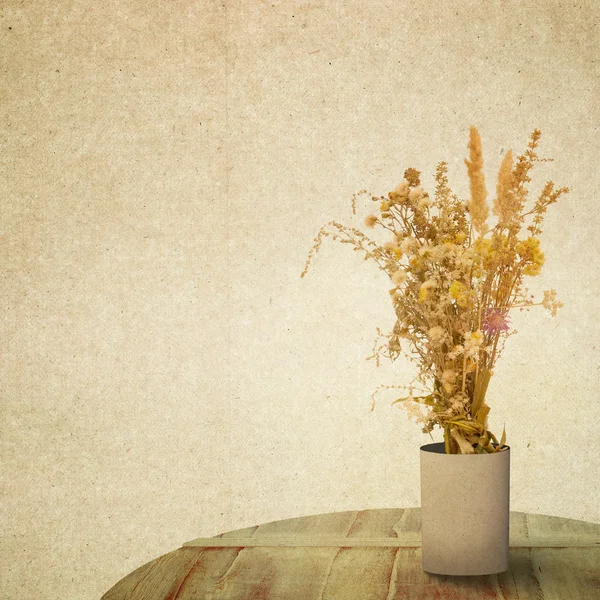 Textured old paper background with flower — Stock Photo, Image