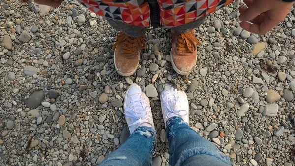 Legs Sneakers Each Other Street Clothes Shoes — Stock Photo, Image