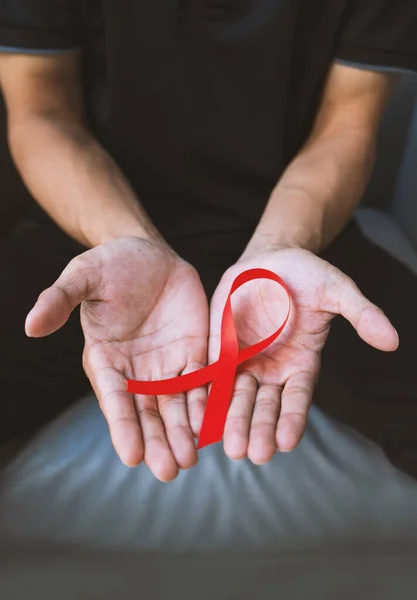 Young Man Red Ribbon Fight Aids Soft Focus Light Background — Stock Photo, Image