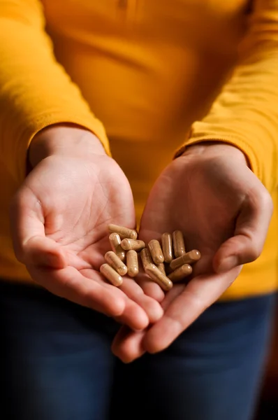 Tablets held in the hand — Stock Photo, Image