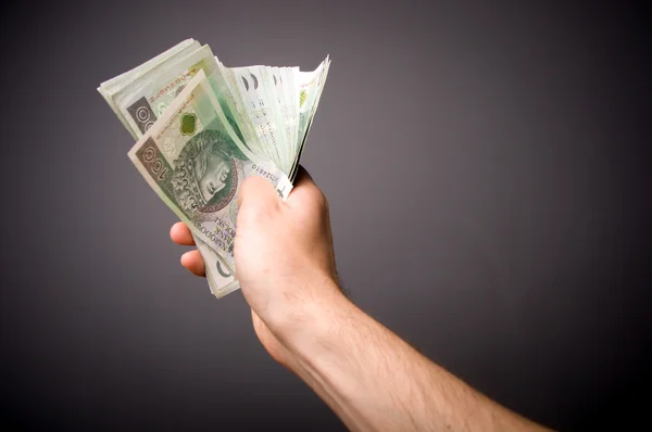 The man holding the hands of banknotes. Polish money — Stock Photo, Image