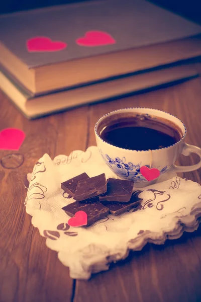 Coffee and chocolate, in the background of the heart from the ca Royalty Free Stock Photos