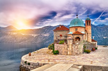 Sunset on the lake in Montenegro clipart