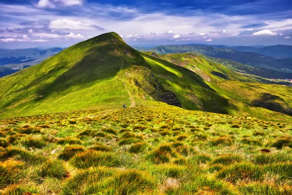 Fantastic sunny hills under morning blue sky. Dramatic landscape — Stock Photo, Image