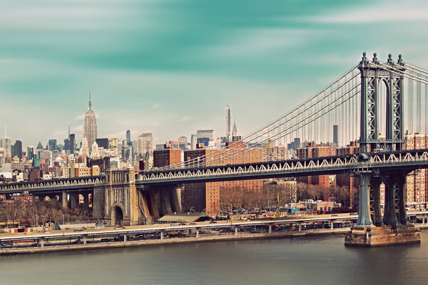 The Brooklyn Bridge and Manhattan, New York City. Filtered image:cross processed vintage effect.