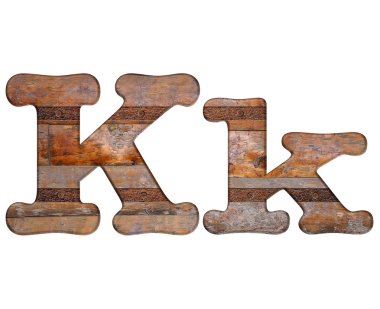 K harfi ahşap ve paslı metal.