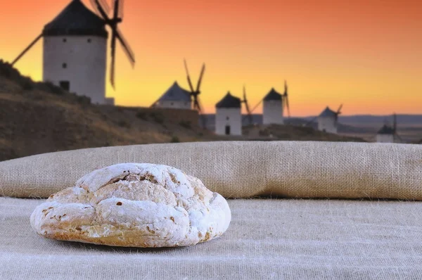 Loaf and windmill. — Stock Photo, Image