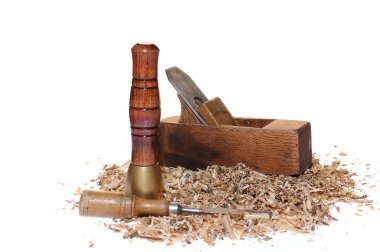 Wood tools and chips on white background