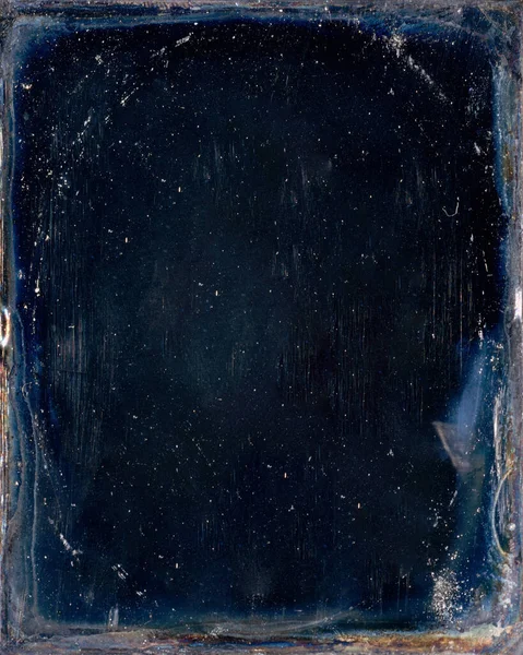 Bu gerçek bir antika Daguerreotype fotoğrafı kullanılarak oluşturulmuş bir fotoğraf dokusu veya kaplaması. Herhangi bir fotoğraf düzenleme projesinde kullanılabilir..