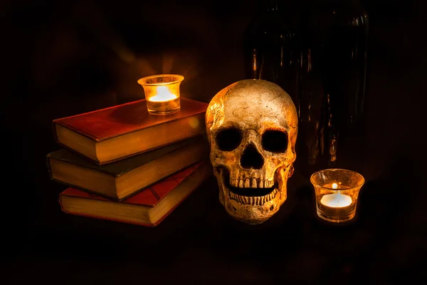 Vintage Skull and Novels by Candlelight — Stock Photo, Image