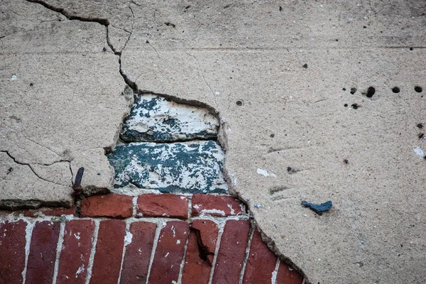 Cracked Concrete with Red Brick — Stock Photo, Image