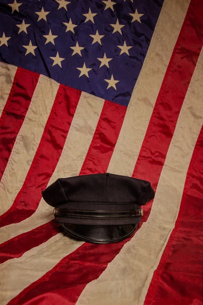 Sombrero de policía con bandera — Foto de Stock