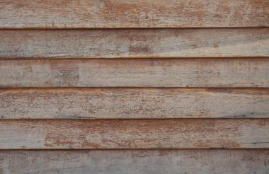 Eski paslı ahşap duvar arkaplanı yatay desenli.