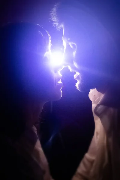Couple Lovers Kiss Night Light Blue Light Rays Pass Faces — Stock Photo, Image