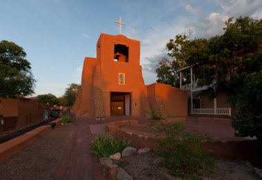 San Miguel Chapel, Santa Fe, New Mexico at sunset. The oldest church in the United States. Built between 1610 and 1626. clipart