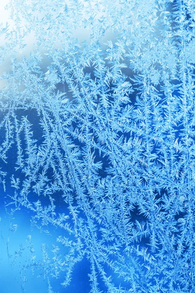 Winter ice frost, frozen background. frosted window glass textur Stockafbeelding