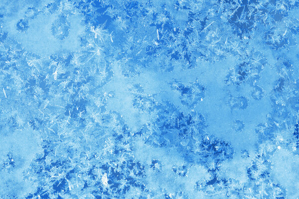 Winter ice frost, frozen background. frosted window glass textur