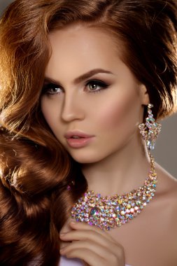 Model with long red hair. Waves Curls Hairstyle. Hair Salon. Upd