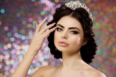 Woman in lux dress crown, queen princess lights party background