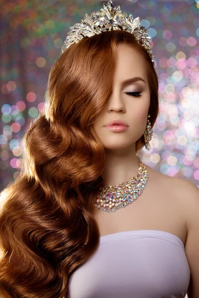 Woman with long red hair in lux dress crown, queen princess ligh — ストック写真