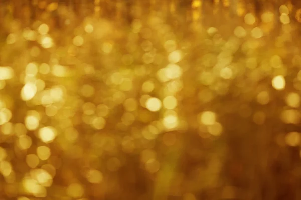 Höst, höst bakgrund. guld abstrakt bokeh defocused lyser bl — Stockfoto