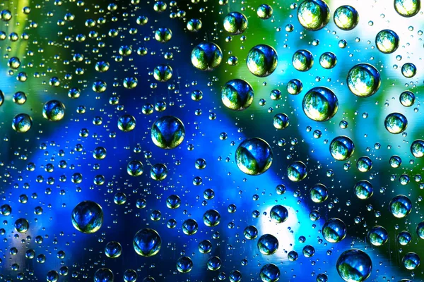 Textura de fondo abstracto gotas de agua y luz de arte en vidrio —  Fotos de Stock