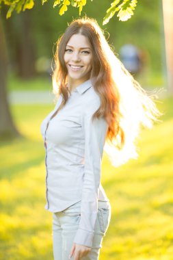 Romantic young girl outdoors enjoying nature Beautiful Model in 