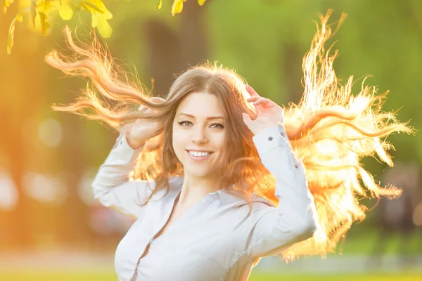 Romantic young girl outdoors enjoying nature Beautiful Model in — Stockfoto