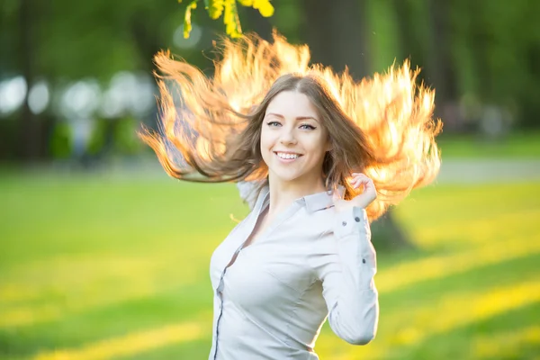 Romantic young girl outdoors enjoying nature Beautiful Model in Εικόνα Αρχείου