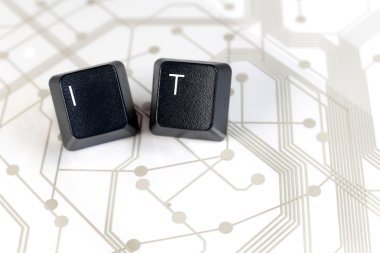 IT, Two Keyboard keys with letters I and T on Circuit Board clipart
