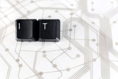 IT, Two Keyboard keys with letters I and T on Circuit Board clipart