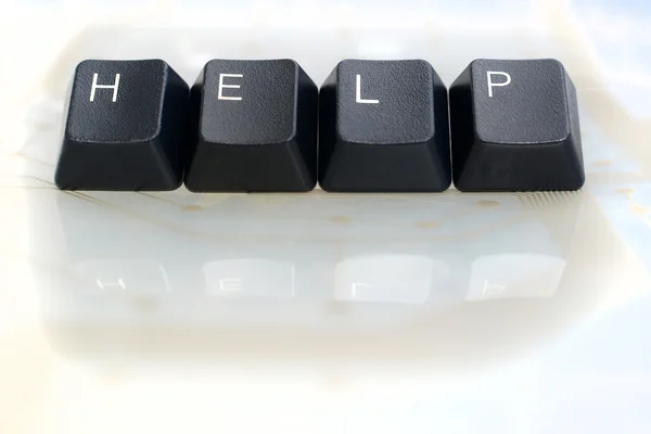 AYUDA DE TI Cuatro teclas de teclado con cable de red en vidrio blanco —  Fotos de Stock