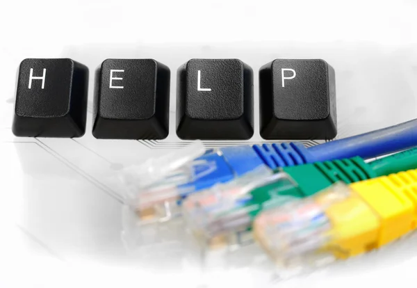 AYUDA DE TI Cuatro teclas de teclado con cable de red en vidrio blanco Imagen de stock