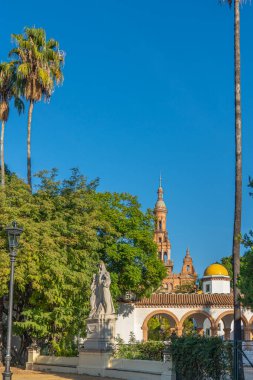 Parque de Maria Luisa is the famous public park with them historical buildings in Sevilla, along the Guadalquivir River in Seville, Spain. vertical