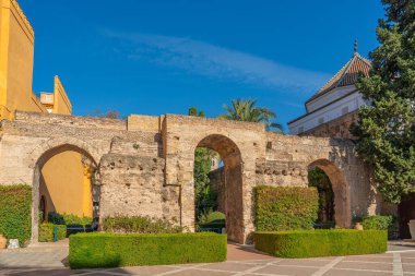 Real Alcazar arch door of Sevilla, Andalusia Spain with beautiful blue sky