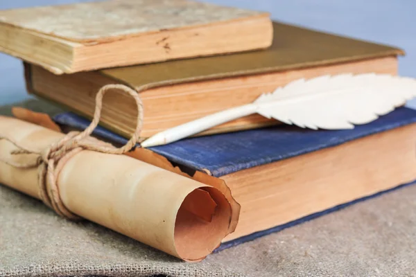 Stack of old books and manuscript on the table — Stock Photo, Image