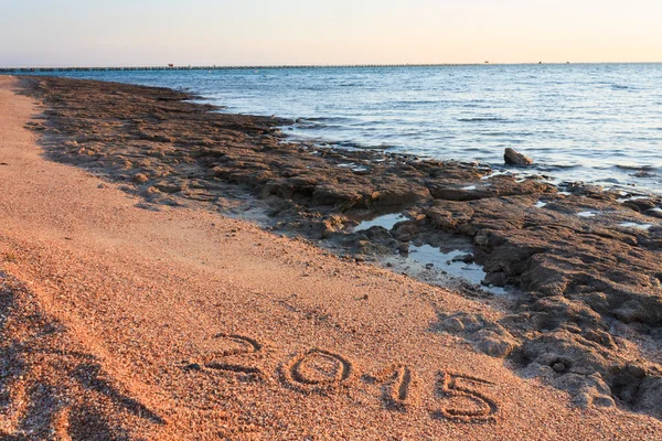 Neues Jahr 2015 am Strand geschrieben — Stockfoto