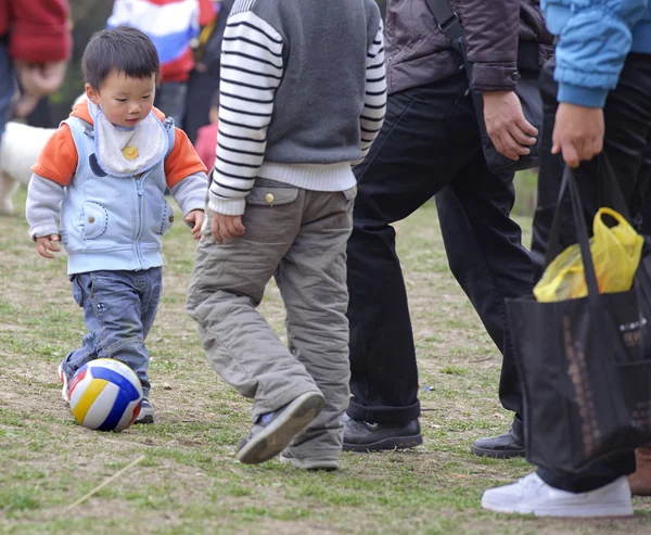 Baby playing football — Stock Photo, Image