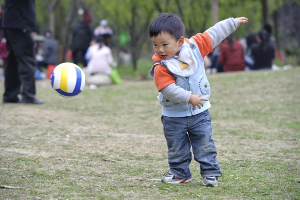 Baby playing football — Stock Photo, Image