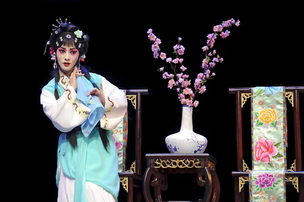 pretty chinese traditional opera actress with theatrical costume