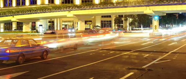 Galope carros e banda de luz — Fotografia de Stock