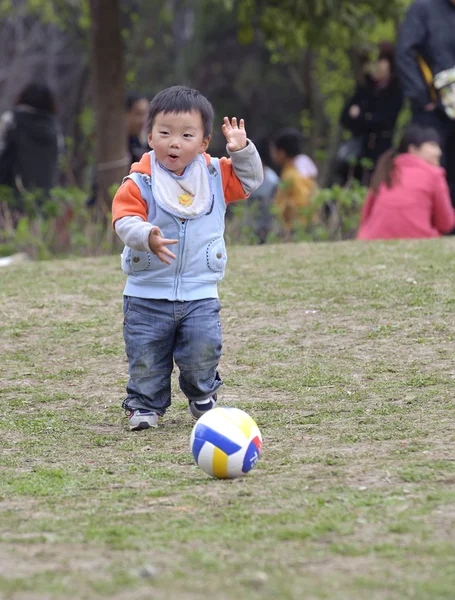 Baby playing football — Stock Photo, Image