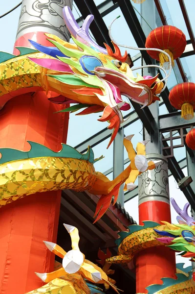 Chinese traditional colorful dragon statue around the pillar Stock Image