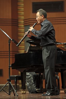 oboist performs on wind music chamber music concert