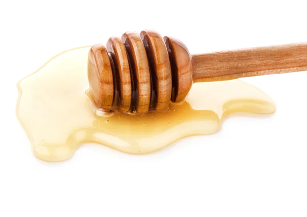 Trempette au miel en bois et miel — Photo