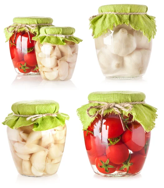 Canned tomatoes and garlic — Stock Image Canned tomatoes and garlic Stock Photo